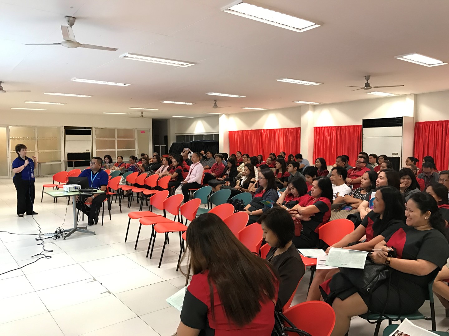 Ayala Coop General Manager Dina Orosa addresses Coop members during one of the chapter meetings held at the Bank of the Philippine Islands head office. 