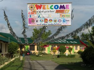The streamer welcoming participants in the Brigada Eskwela 2017 project at the Sta. Cruz Elementary School hangs in front of the school grounds. 
